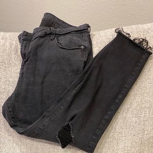 Old Navy Women’s Distressed Rockstar jeans with frayed bottoms
